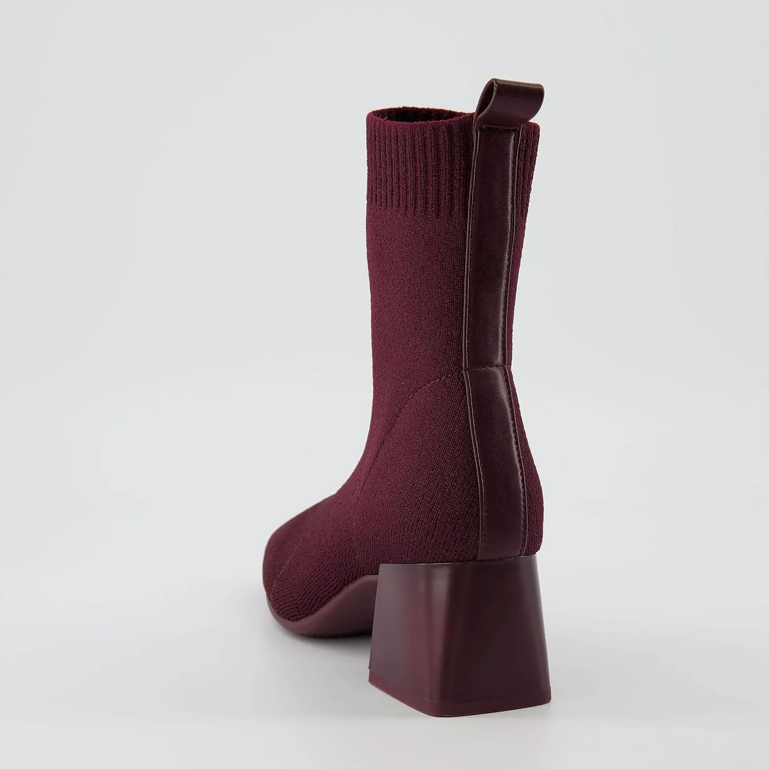 CUSHIONAIRE Women's Milo Stretch Ankle Sock Boot – Soft Knit Upper, Memory Foam Padding, Lightweight 1.75" Heel, Wide Widths Available