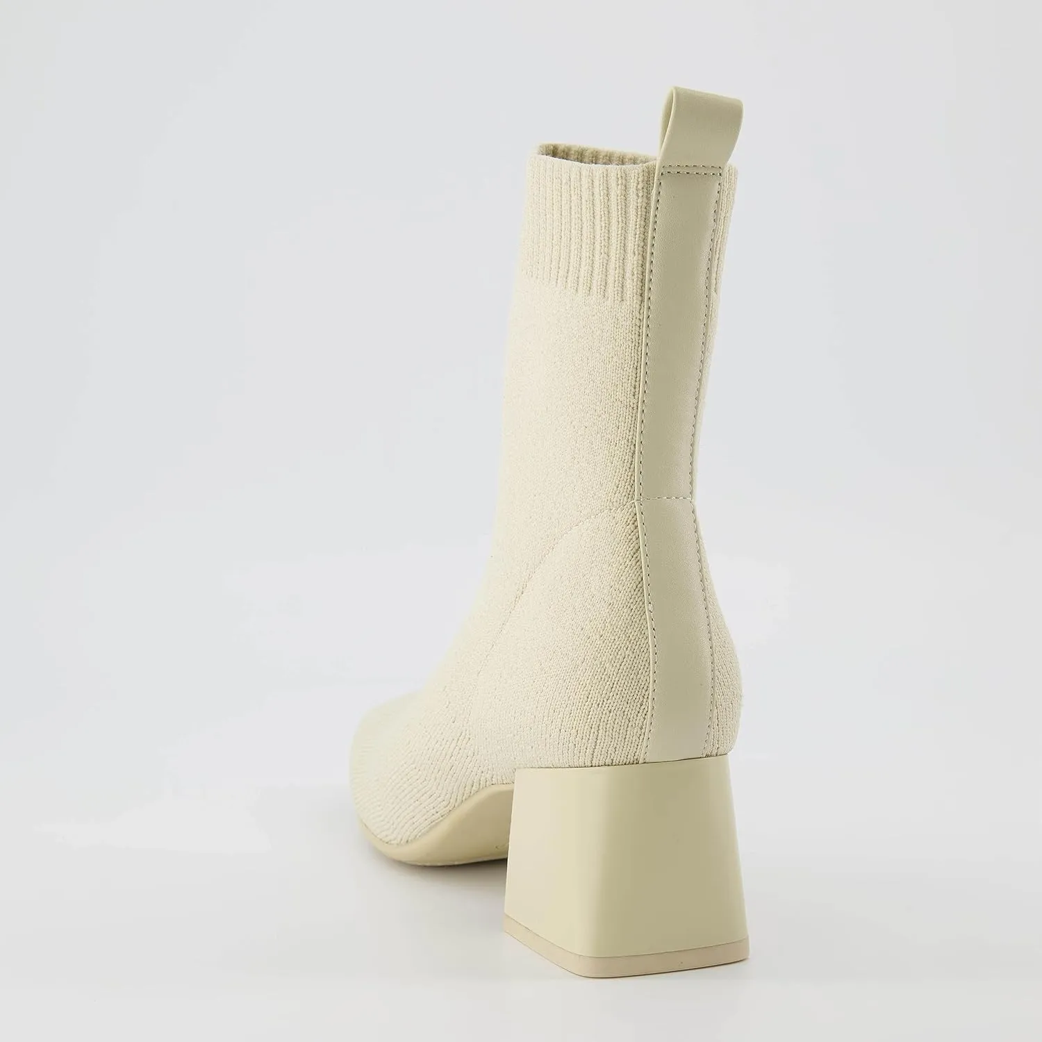 CUSHIONAIRE Women's Milo Stretch Ankle Sock Boot – Soft Knit Upper, Memory Foam Padding, Lightweight 1.75" Heel, Wide Widths Available